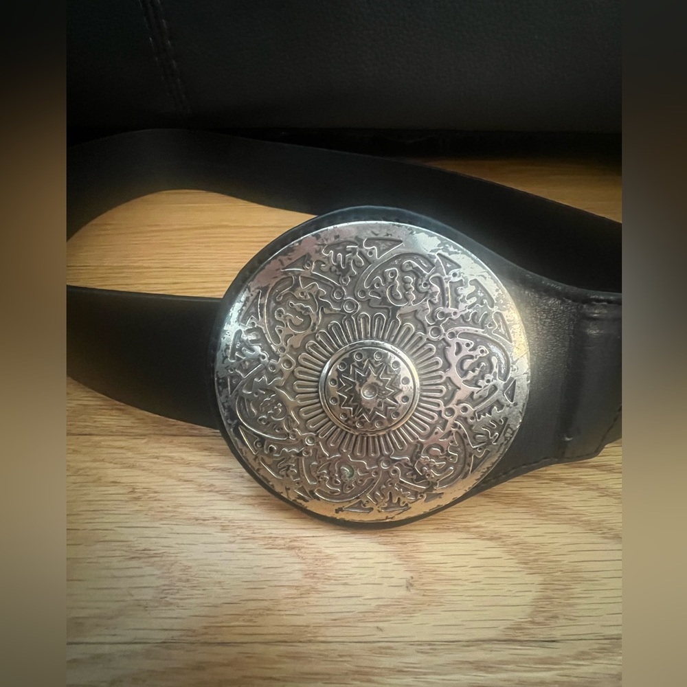 - Chico’s black leather belt large round silver ornate coin style buckle